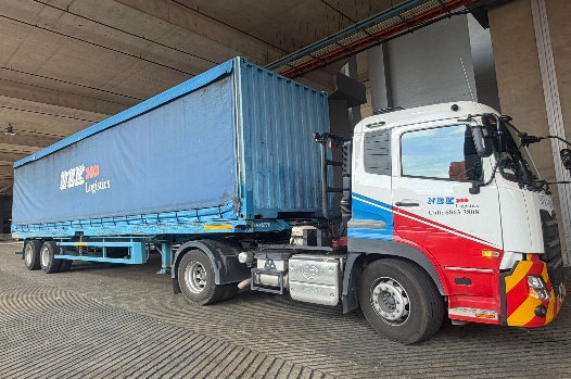 NEK Logistics open canopy trailer